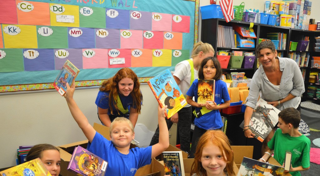 Our students unboxing the amazing treasures donated to us!